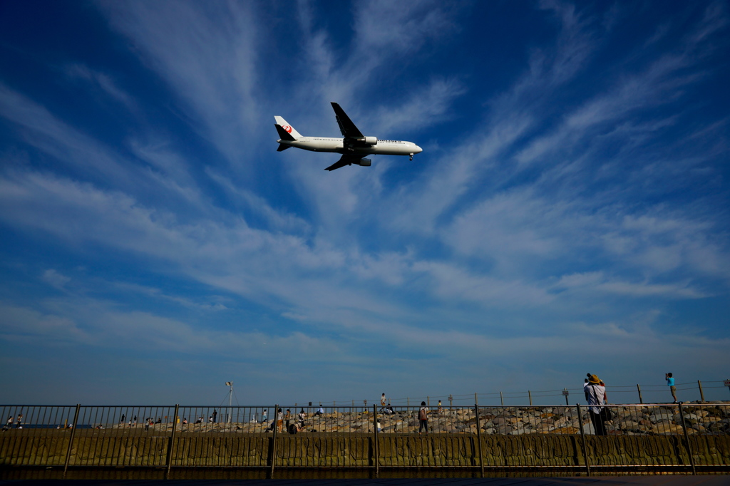 Boeing in sunny sky