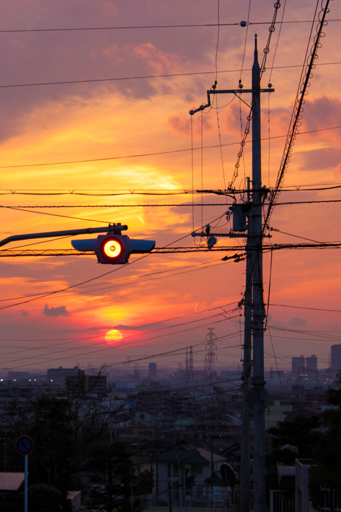 夕日と赤信号
