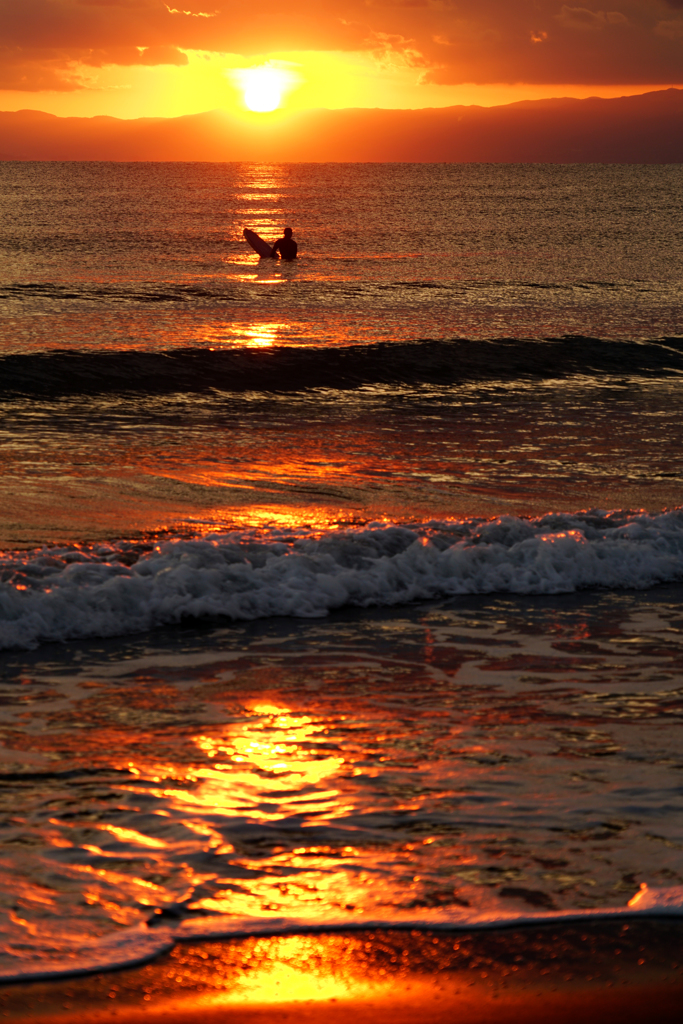 しばし夕陽に