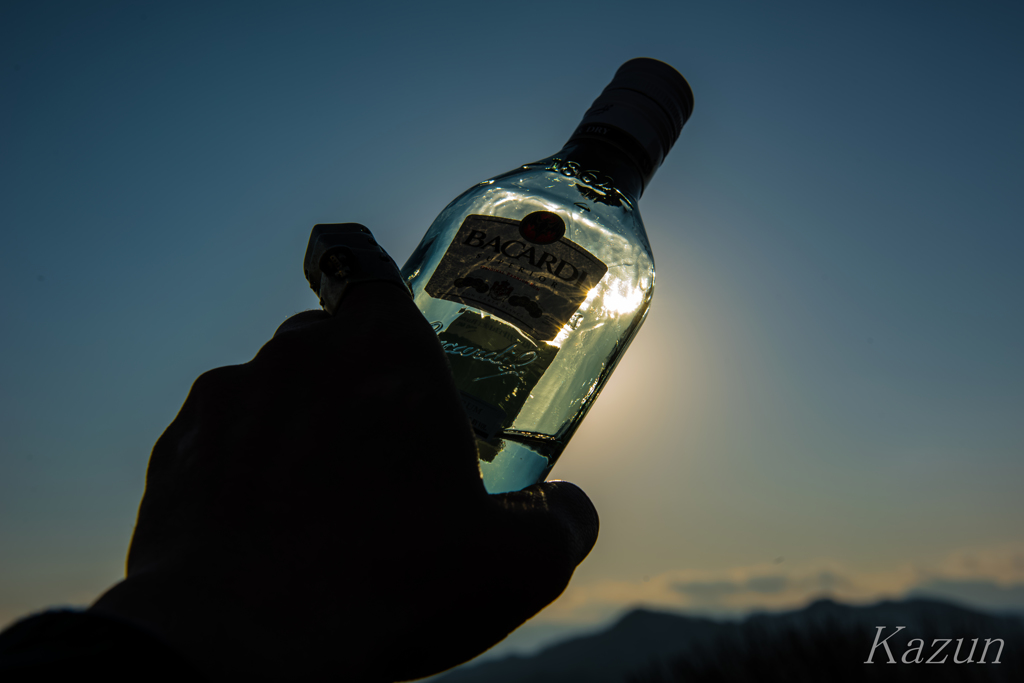 pull at a rum bottle