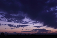 暗雲と夕景