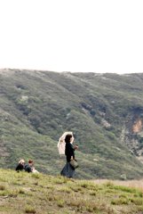 草千里の傘の日本人