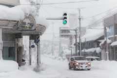 雪の降るまちを