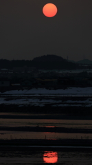 信濃川に溶け込む夕日
