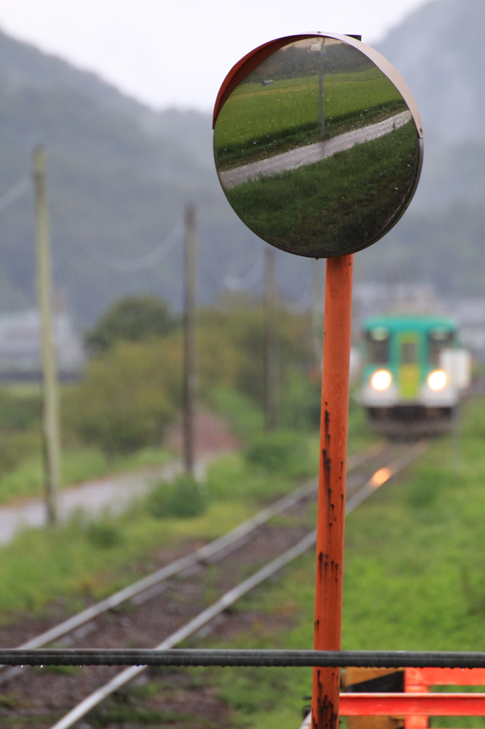 雨中にたたずんで