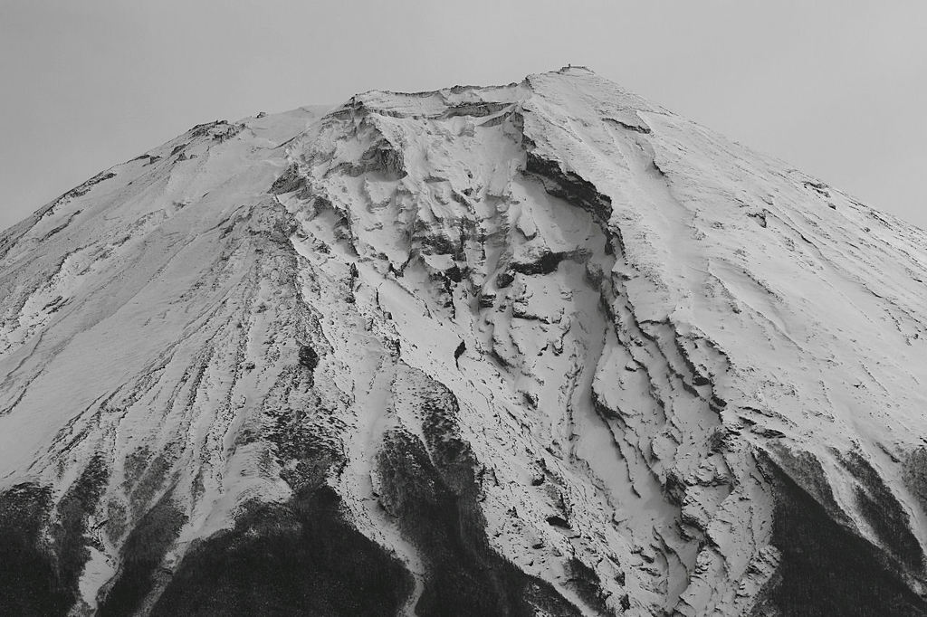 厳