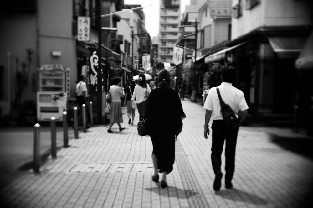 行く人