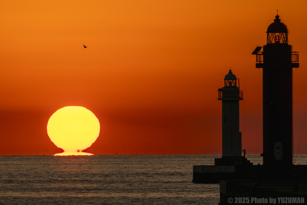 ダルマと2本のロウソク