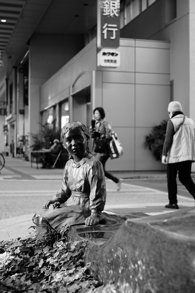 彼女