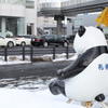 見守る背中