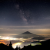 Milky way in the sea of ​​clouds