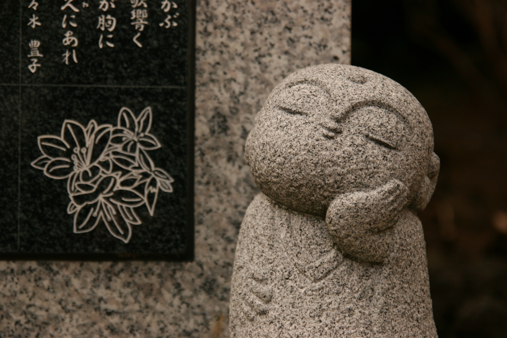 考える人