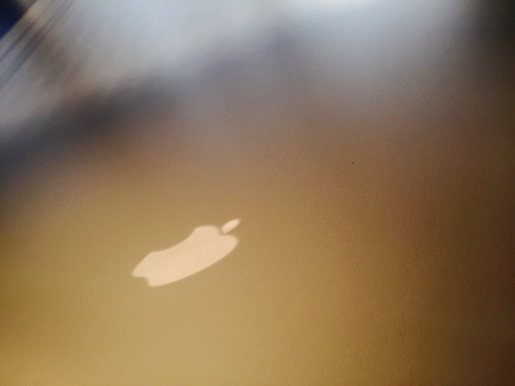 Apple on the desk.