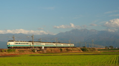 立山連峰を背に富山駅に向かう特急北越6号T13編成　2014-10-26撮影