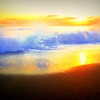 夕日と波
