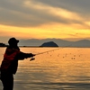 夕暮れの釣り師
