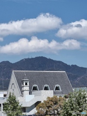 Church and white clouds