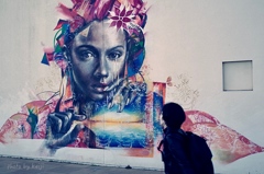 People watcing murals