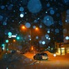 雪の降る街