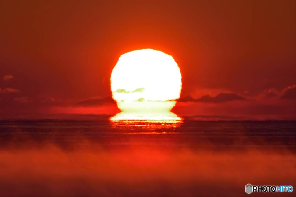 燃える海上だるま