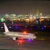 飛行機と工業地帯