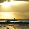 surfrider in the evening light