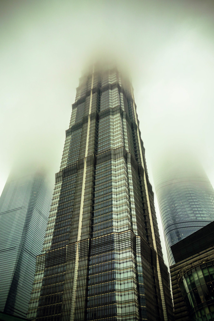 skyscrapers pierce the clouds