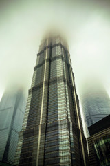 skyscrapers pierce the clouds