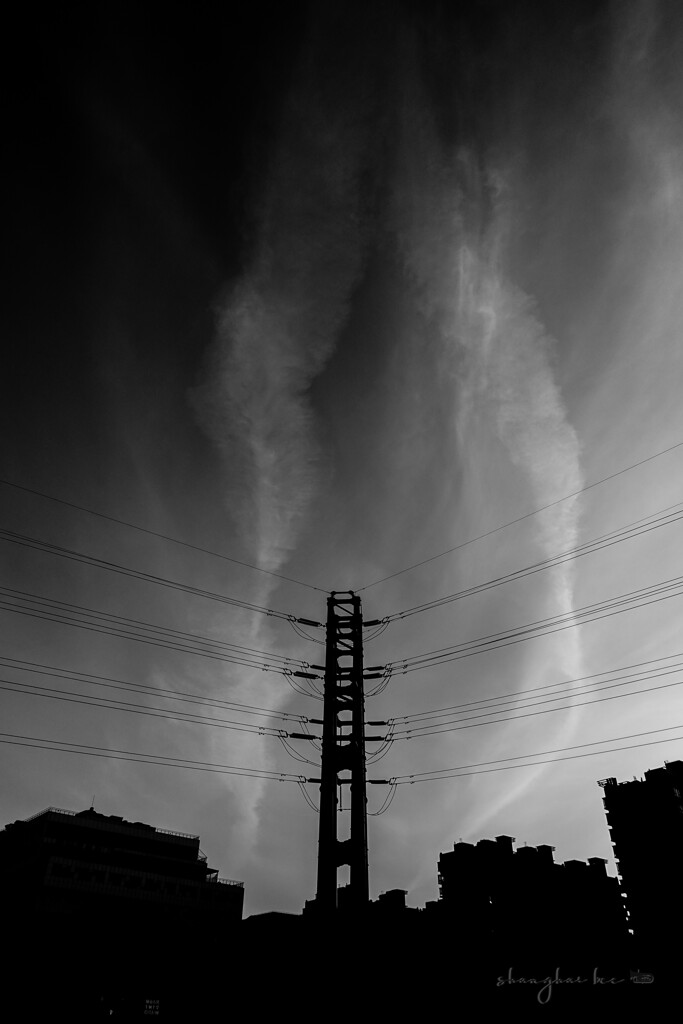 cirrus and steel tower