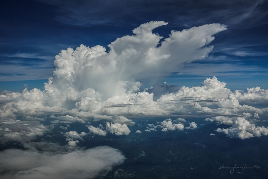 growing cumulonimbus clouds