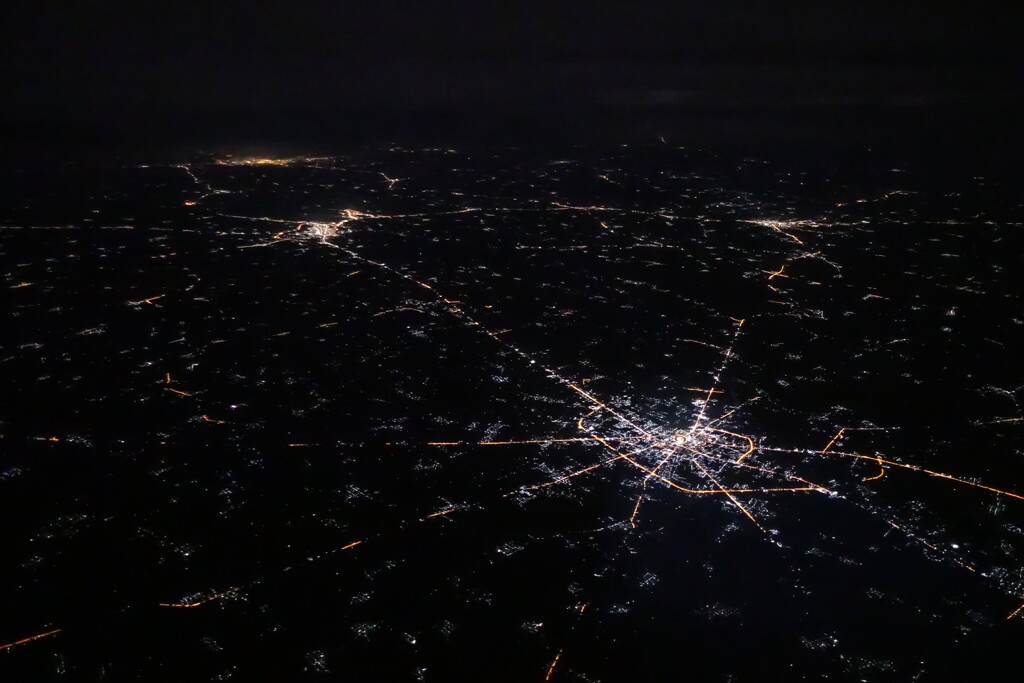 the twinkle of  town lights