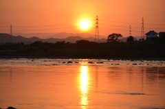 夕陽　穏やかな流れ