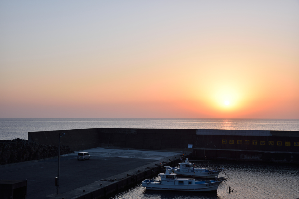 黄砂に沈む夕日