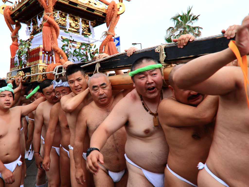 夏祭りの男達