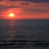 夕陽海染めて