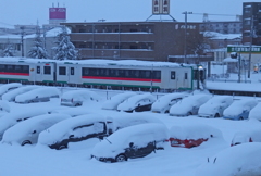 雪をかき分けて