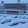 雪をかき分けて