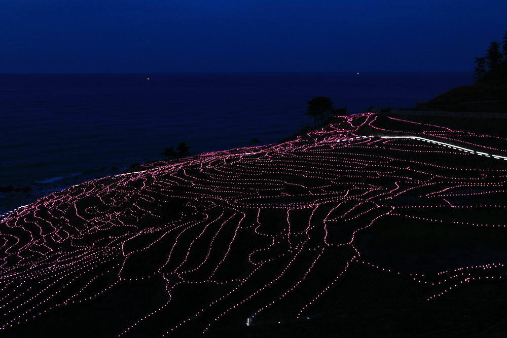 海辺の星と漁り火