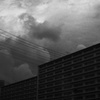 梅雨の雲と廃墟