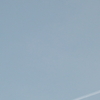 月と飛行機雲・・・