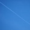 仕事帰り、見上げた空に飛行機雲・・・