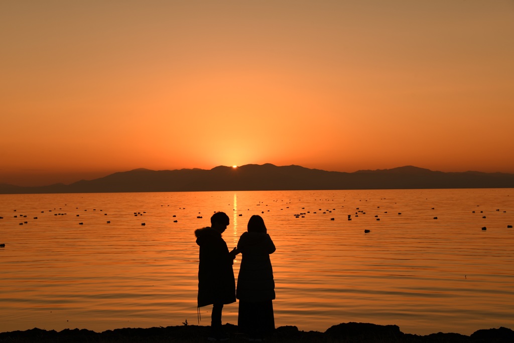 気になる二人の夕陽