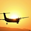 夕陽のプロペラ機