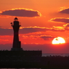 釧路副港からの灯台と沈む夕陽