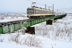 雪景色常願寺川
