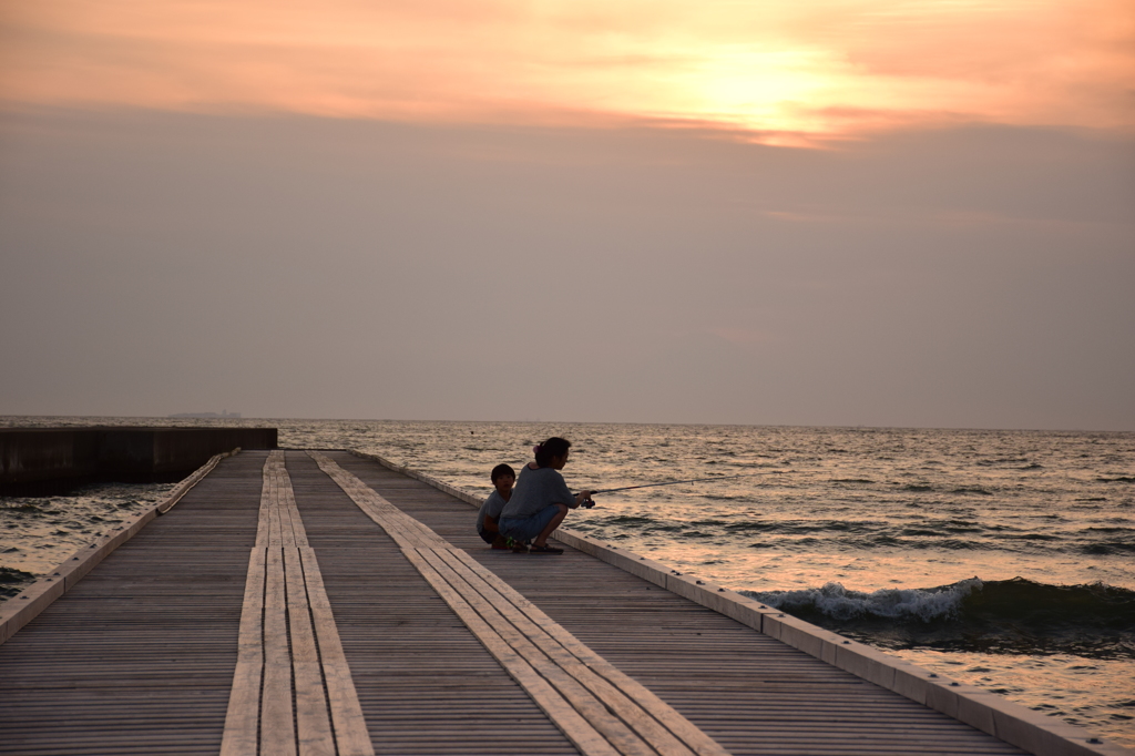 mother and son and the sea