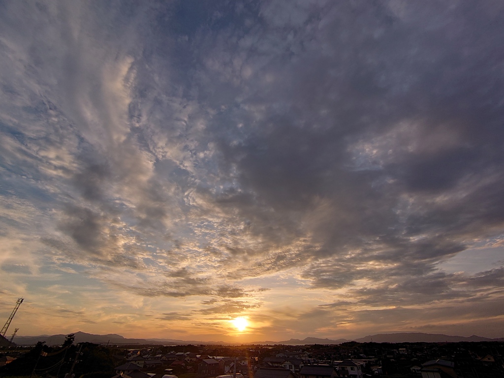 染まっていく雲