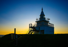 夕日の灯台