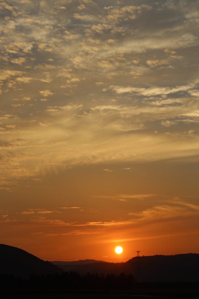 沈む夕日に、また明日③