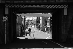 under the girders of a railway